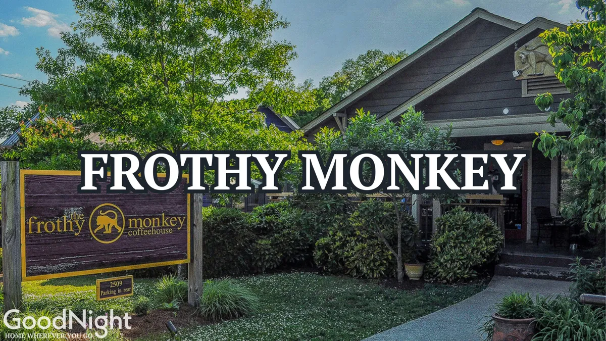 The exterior of Frothy Monkey, a well-known local coffee shop, with inviting landscaping and an architectural style that feels both cozy and current, ideal for socializing, reading, or working remotely.